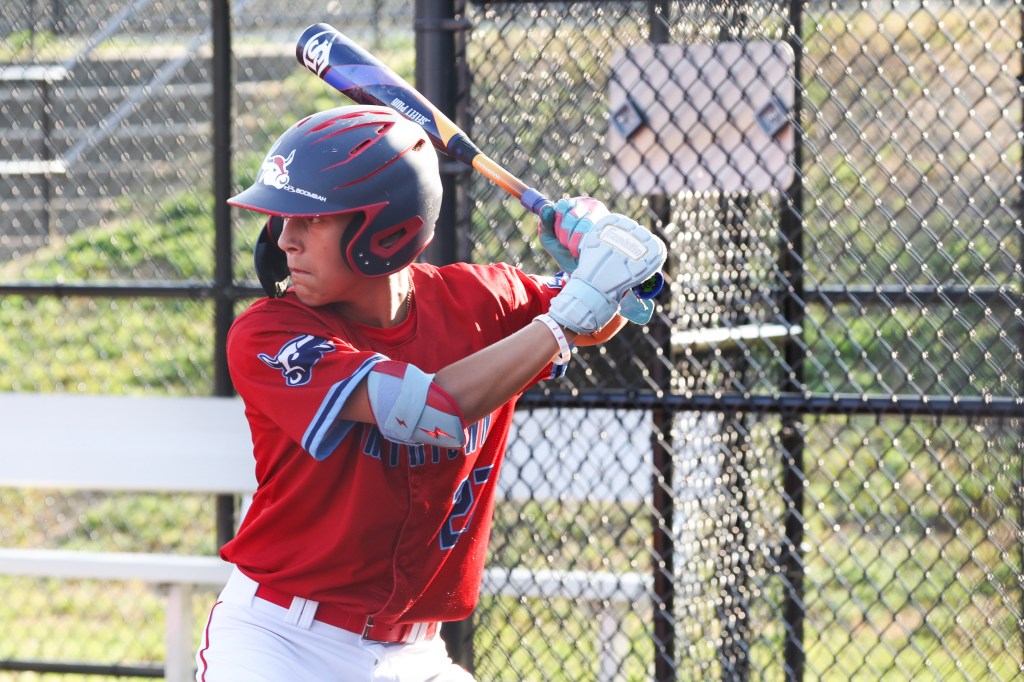Ryan Delgado #27 at bat during a St. James-Smithtown Little League practice in St. James, N.Y. on Monday, July 28, 2025. 