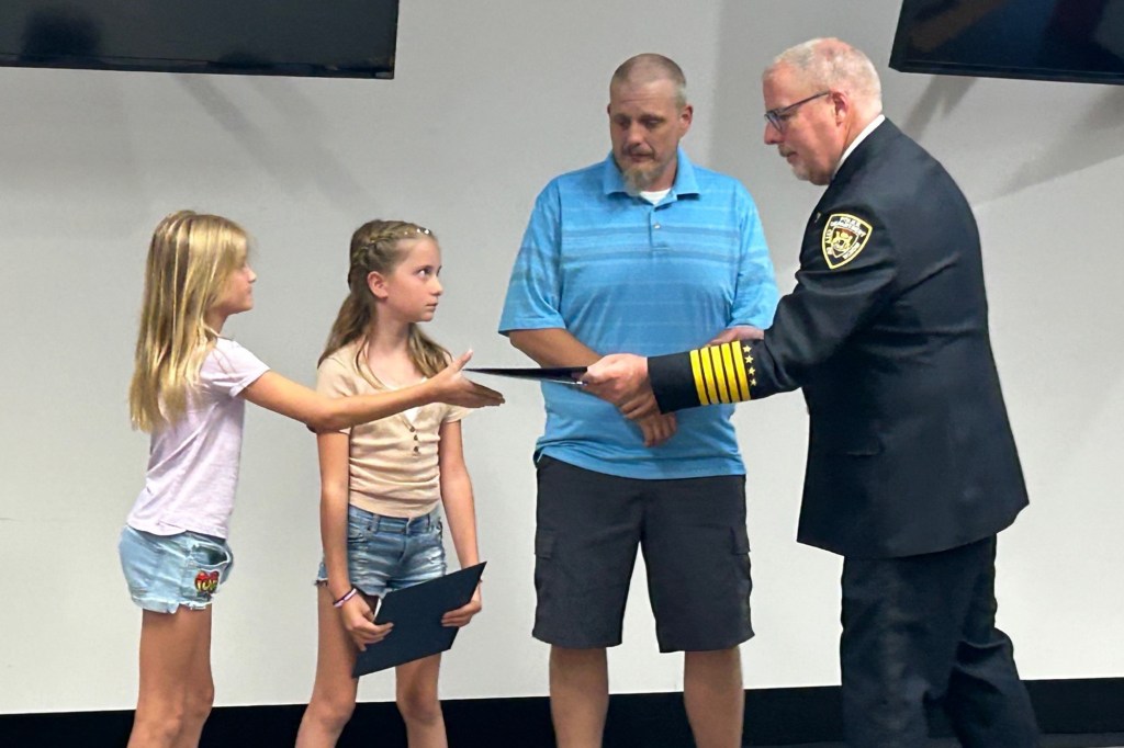 Wixom Police Department honored  Ava, Addison and Cody with the Police Department Civilian Citation Award 
