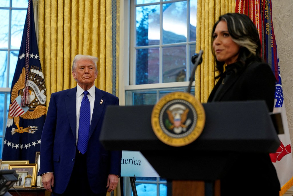 President Trump and Tulsi Gabbard at a swearing-in ceremony.