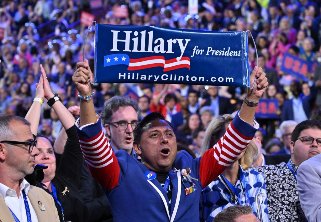 Person holding a Hillary for President banner at the Democratic National Convention.