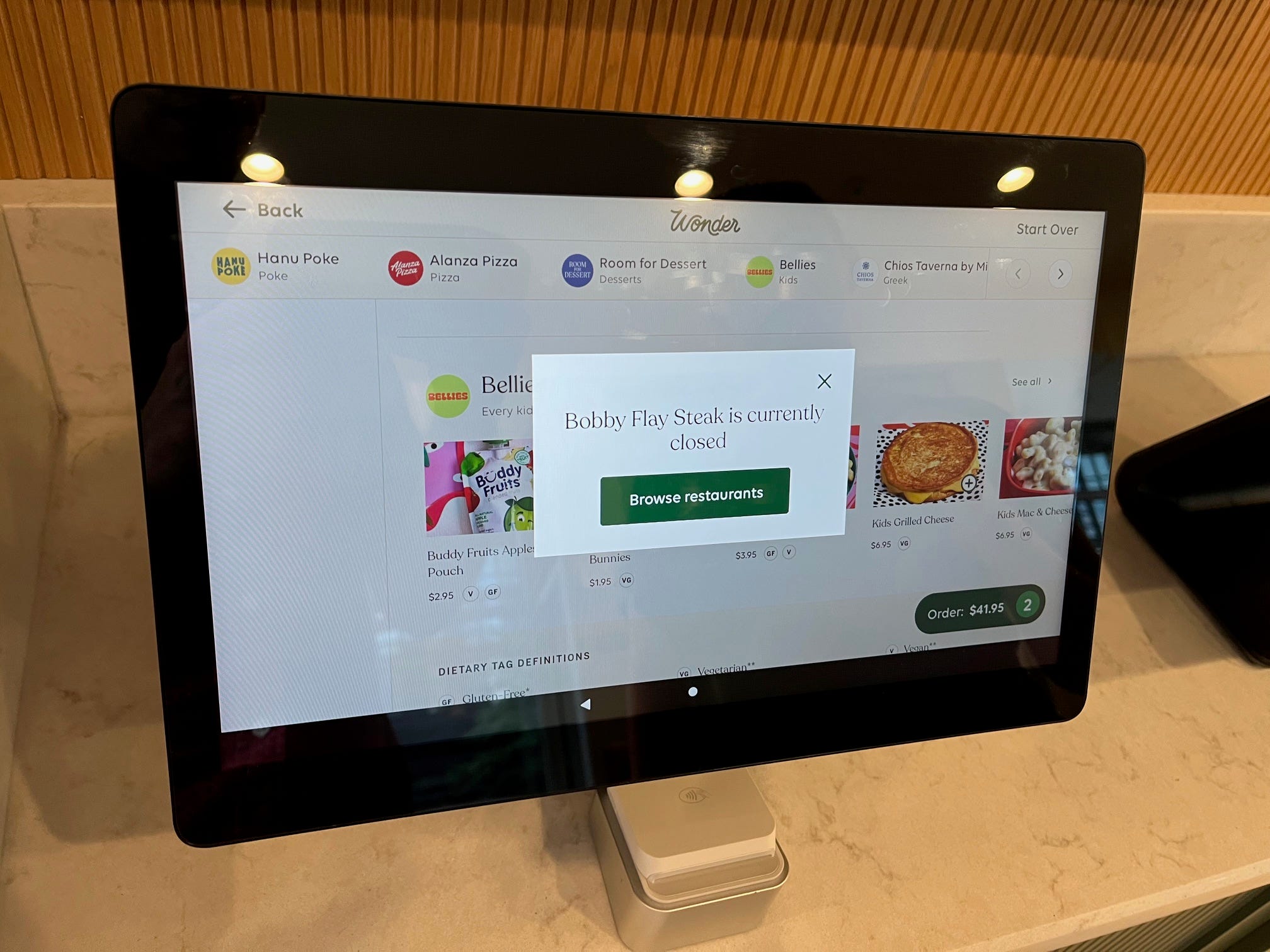 An ordering screen at Wonder reads: "Bobby Flay Steak is currently closed"