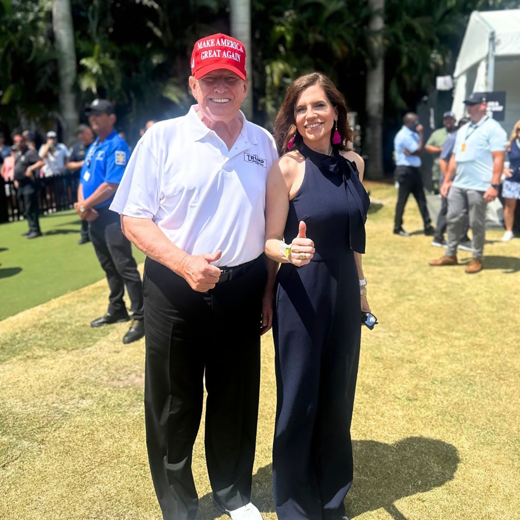 Donald Trump and Nancy Mace giving thumbs up.
