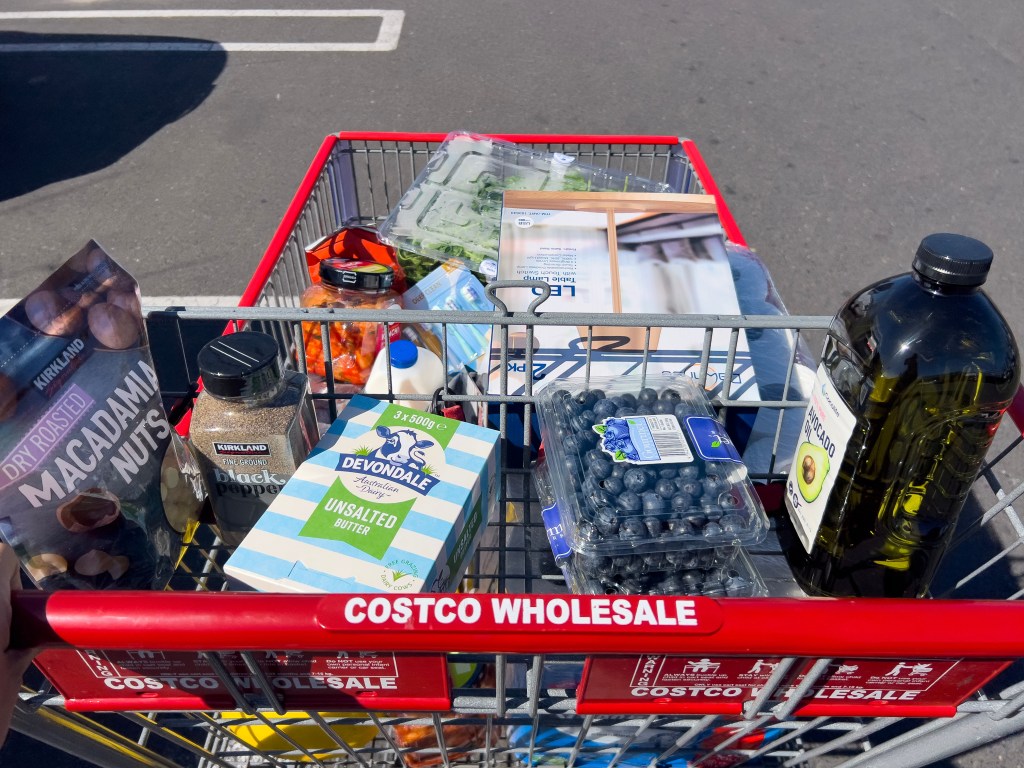 Costco shopping cart full of groceries.