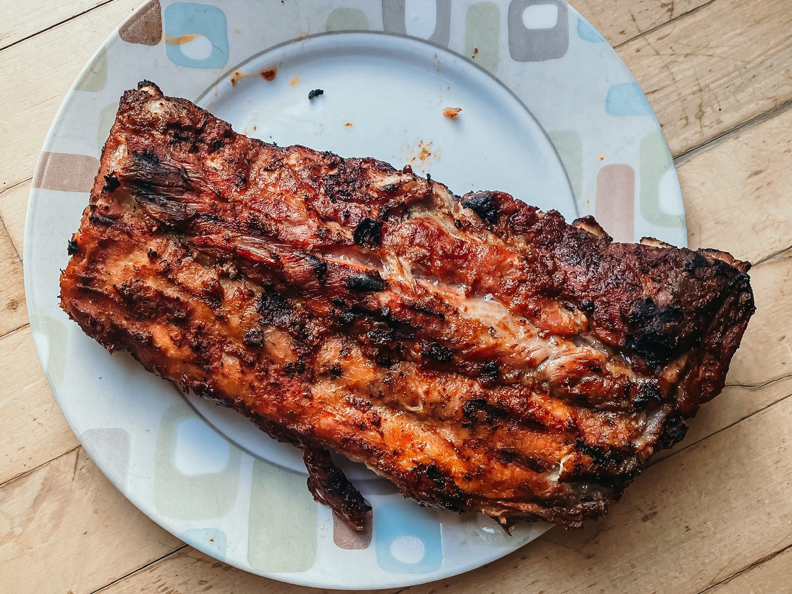 rack of ribs on a plate right off the grill