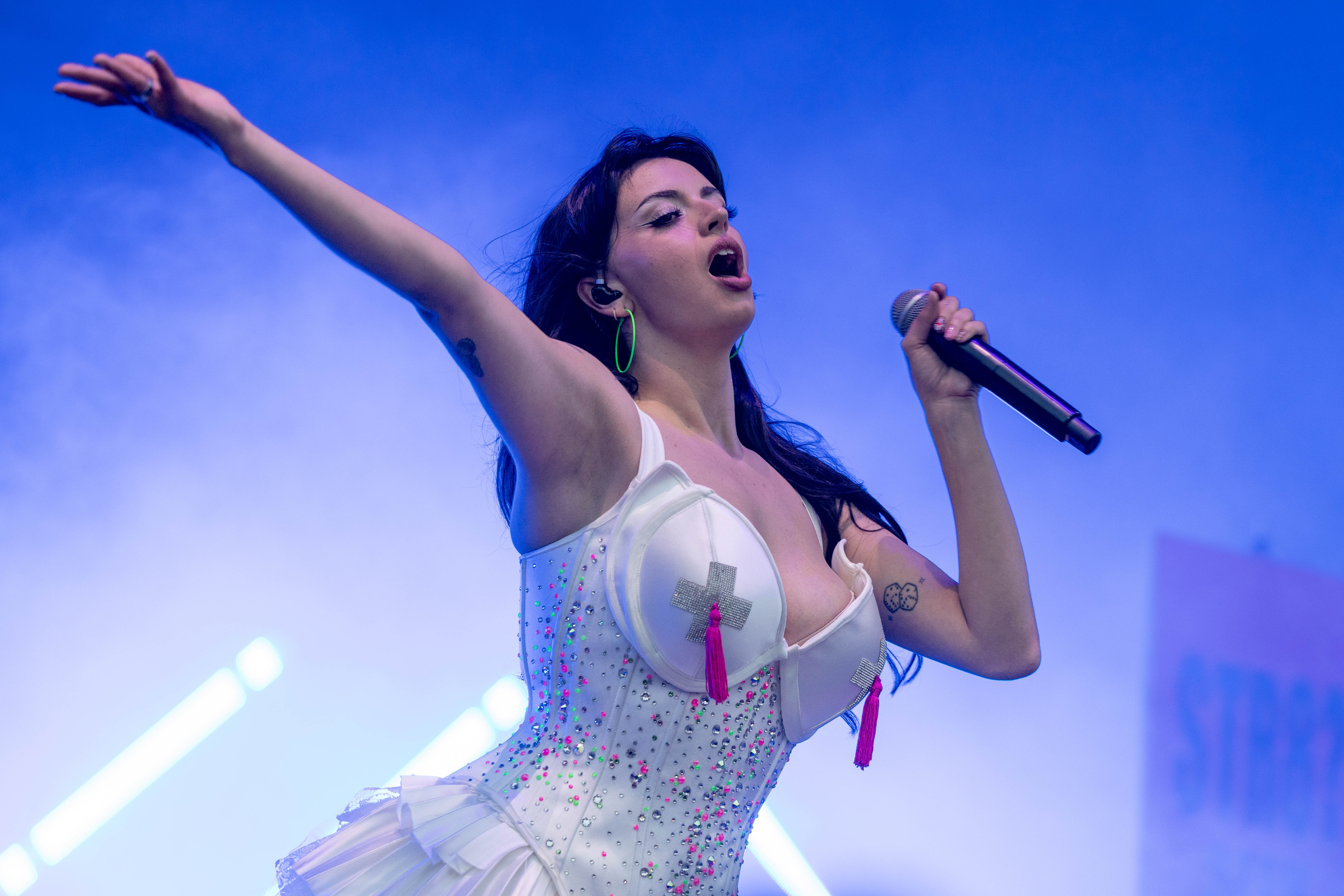 Rebecca Black channels Madonna's tassels while performing at Lollapalooza Music Festival in Chicago.