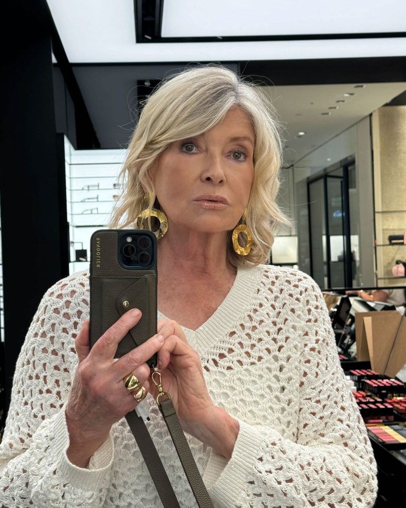 Martha Stewart taking a mirror selfie