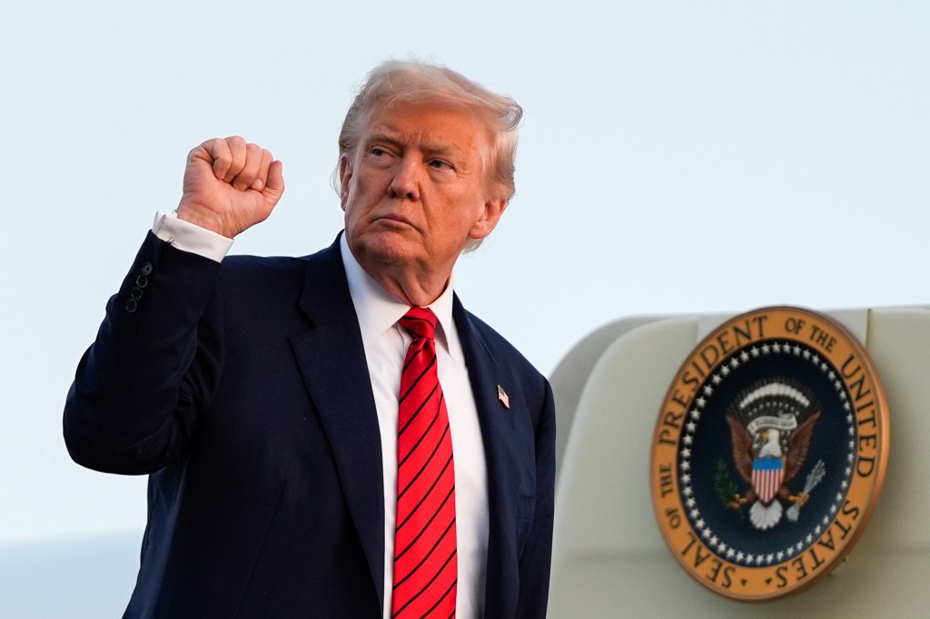 President Trump giving a fist pump.