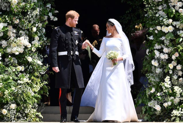 Prince Harry and Meghan Markle leave after their wedding ceremony at St. George's Chapel in Windsor Castle in Windsor, near London, England, Saturday, May 19, 2018.
