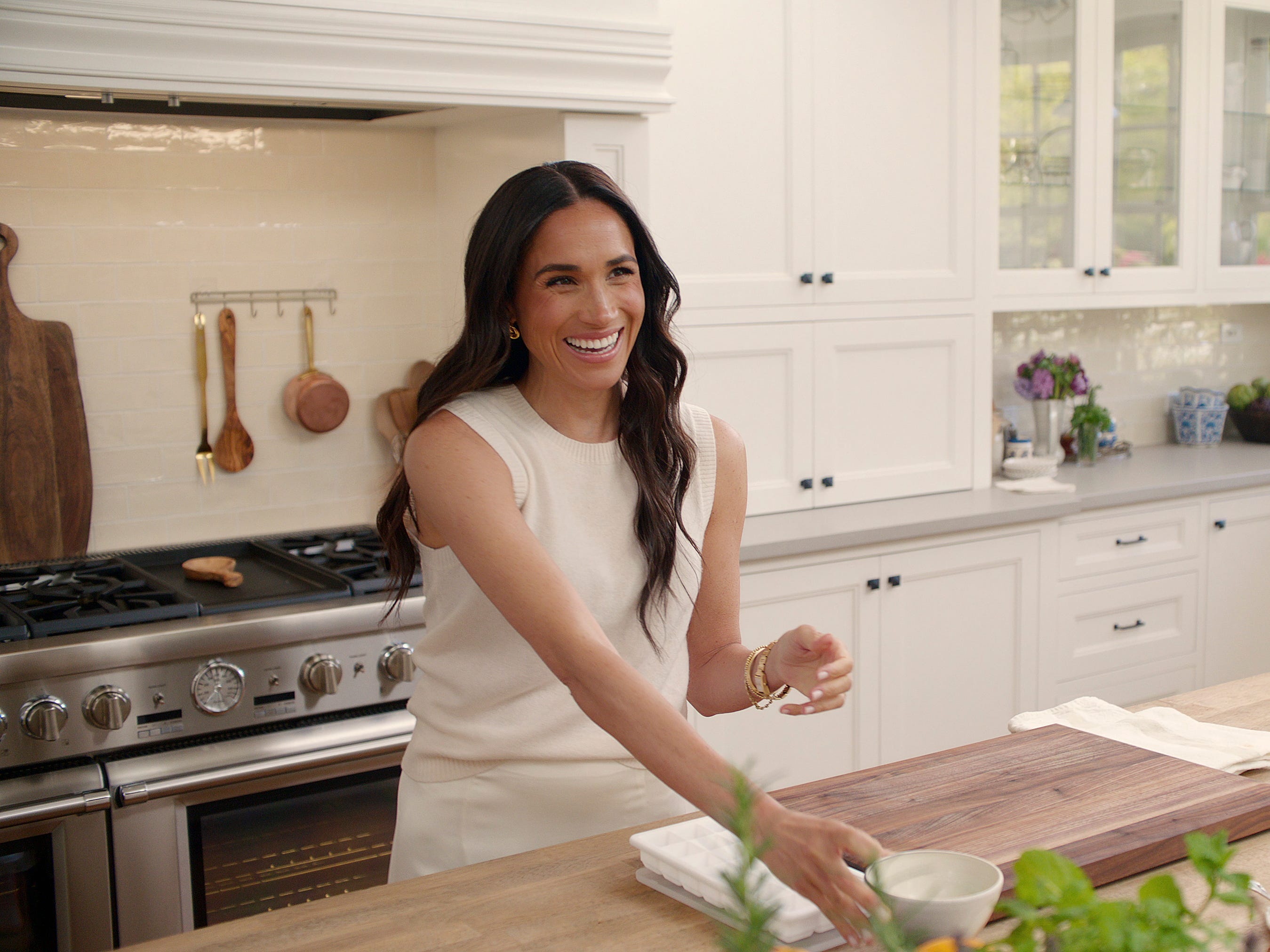 A photo of Meghan Markle in a kitchen.