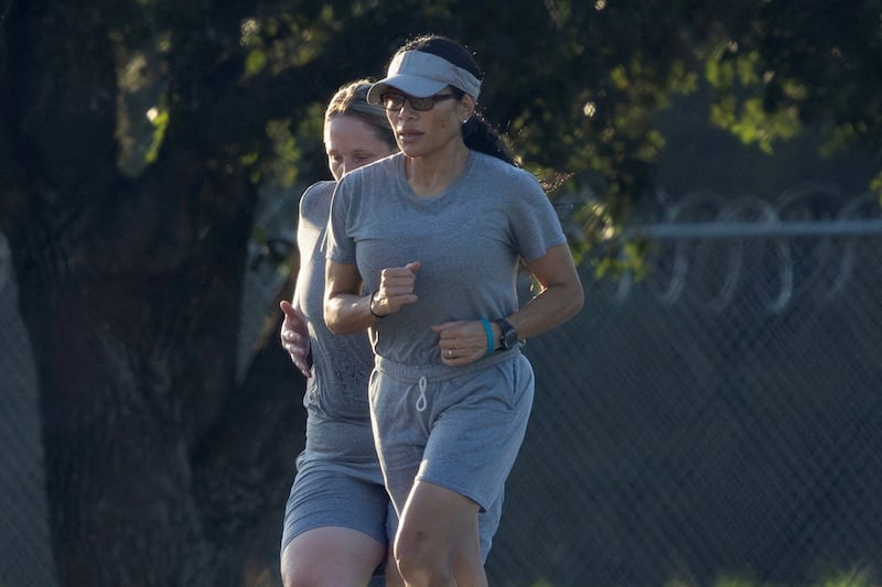 Reality TV star Jen Shah, who is serving a prison sentence for wire fraud, runs on the track at the Federal Prison Camp Bryan on Sunday.