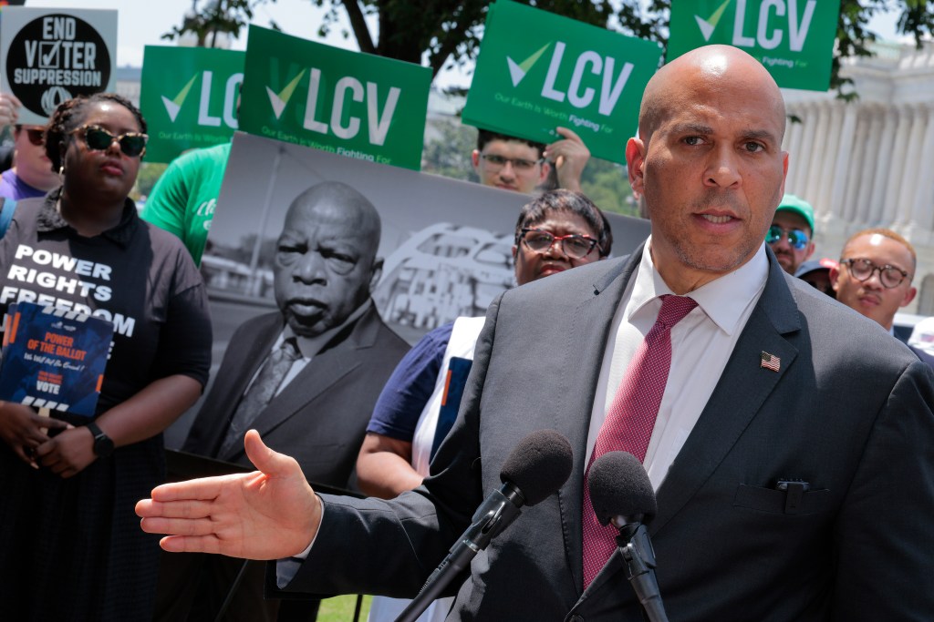 Sen. Cory Booker (D-NJ) joins civil rights and voting rights advocates for a rally to reintroduce the John R. Lewis Voting Rights Advancement Act outside the US Capitol on July 29, 2025