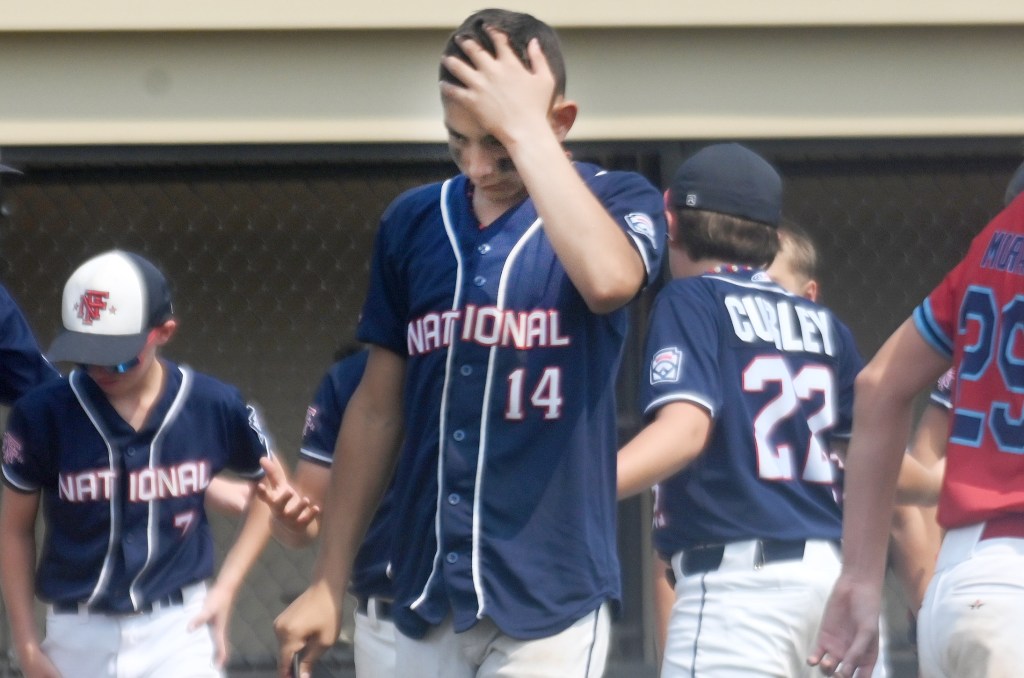 Fairfield's SJ Taxiltaridis (14) reacting to the 6-1 loss during the East Regional Little League Regional Tournament game, Fairfield vs St Jamestown, on Monday August 4, 2025.
