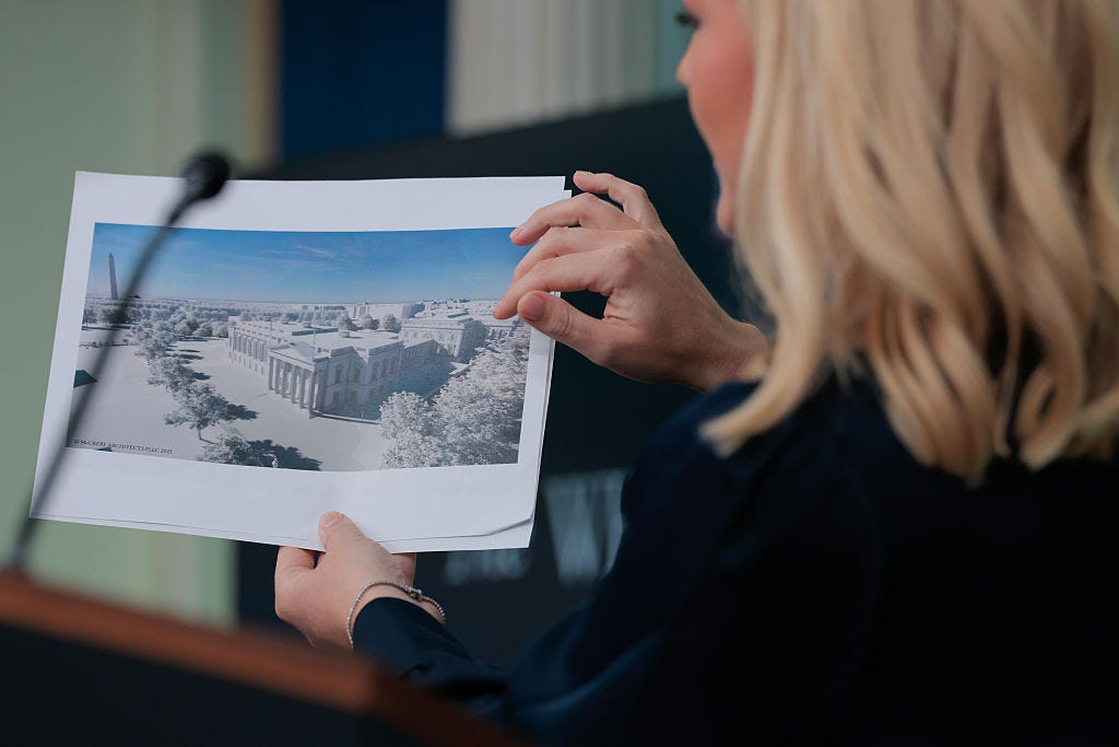 Karoline Leavitt holds a rendering of a state ballroom addition to the White House.