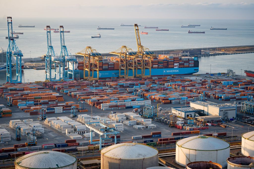 Aerial view of cargo ships and containers in the port of Barcelona.