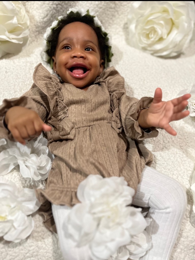 Photo of smiling baby River Edima Wilson.