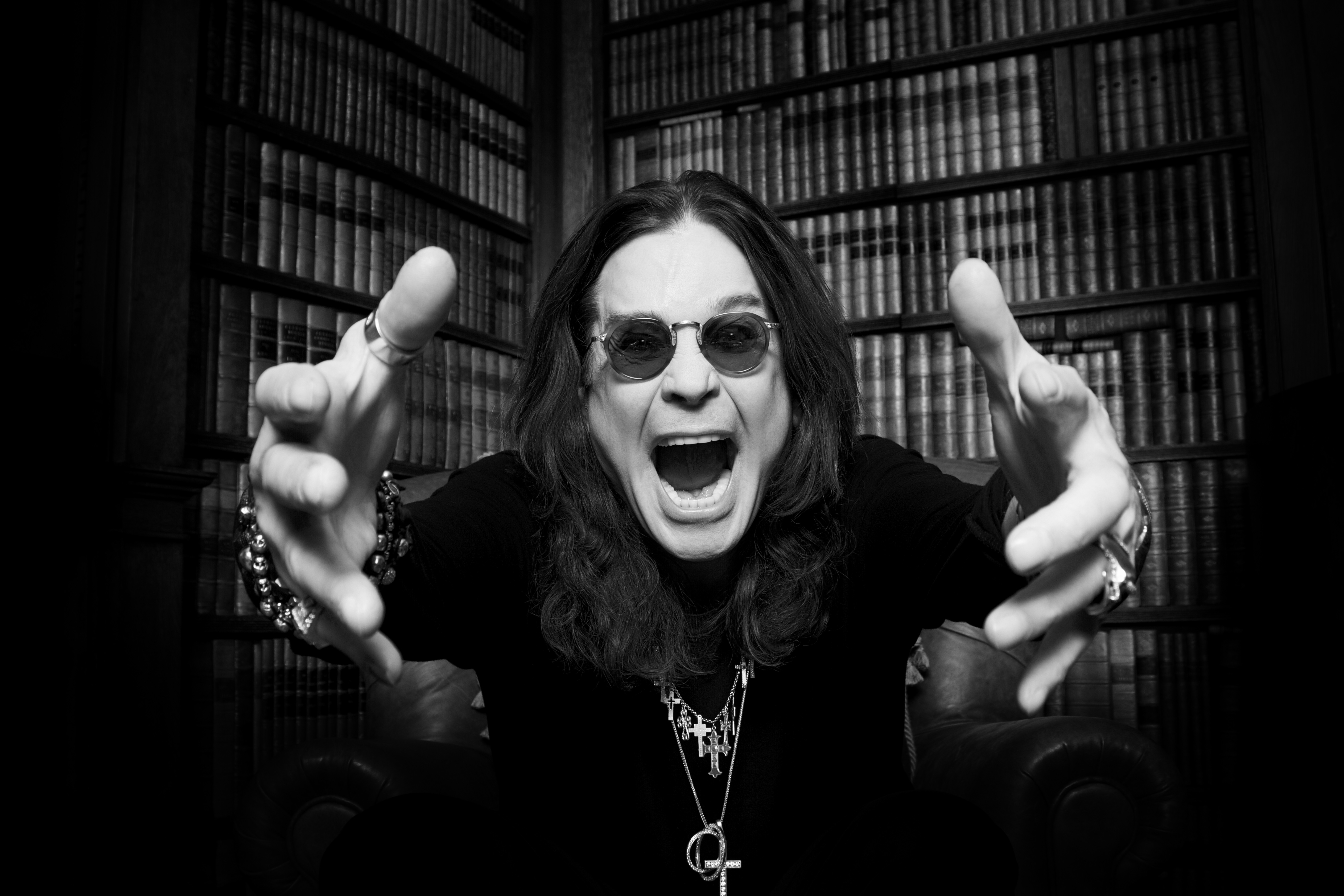 Ozzy Osbourne screams at a camera. 