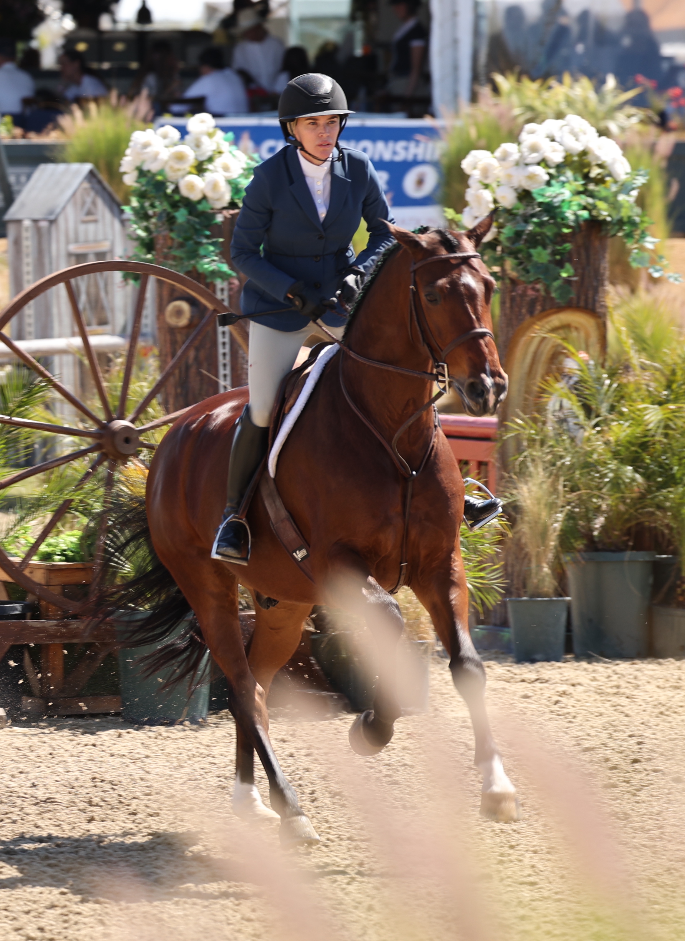Teddi Mellencamp riding a horse