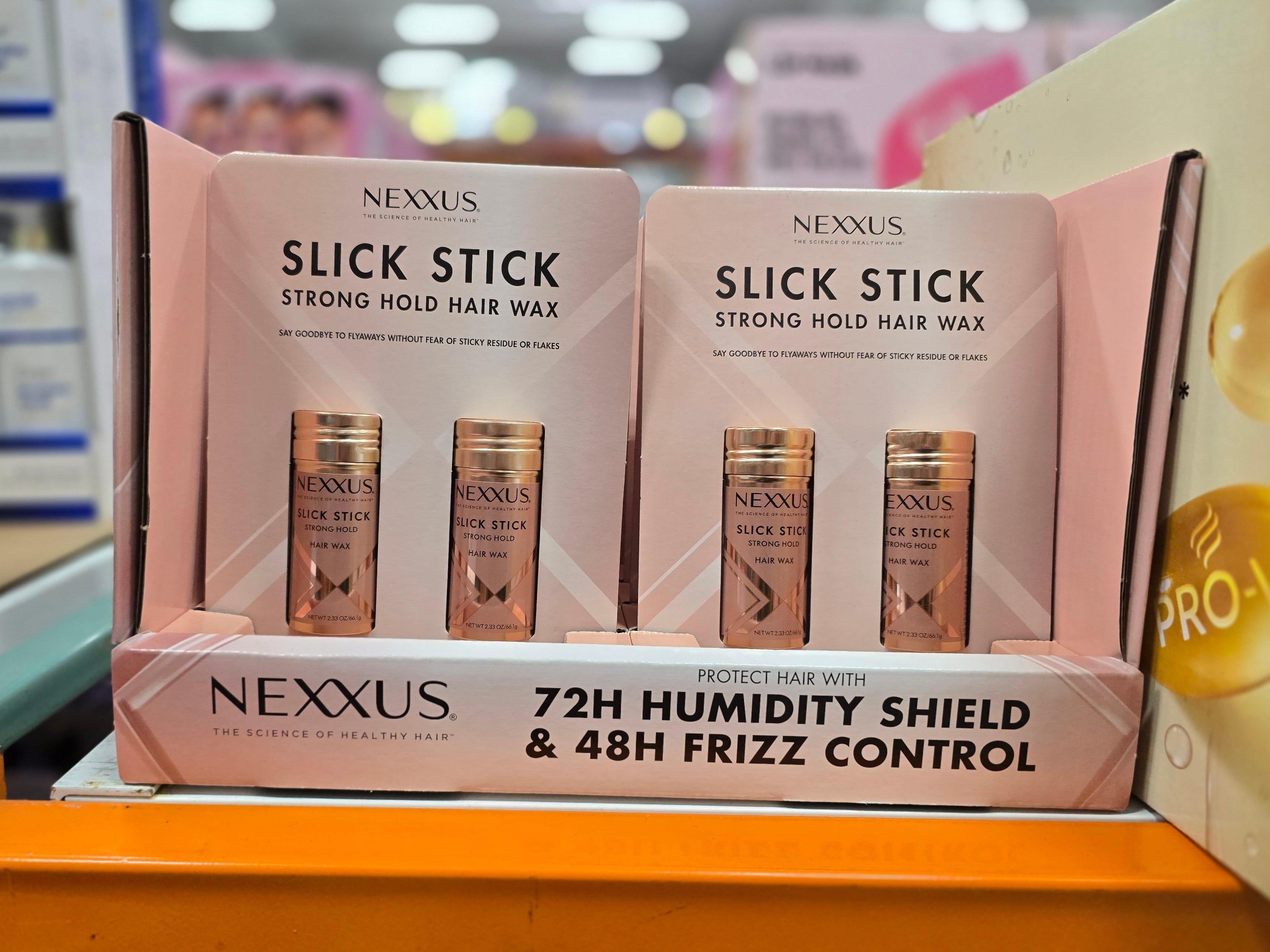Twin packs of Nexxus Slick Stick hair wax on display at Costco.