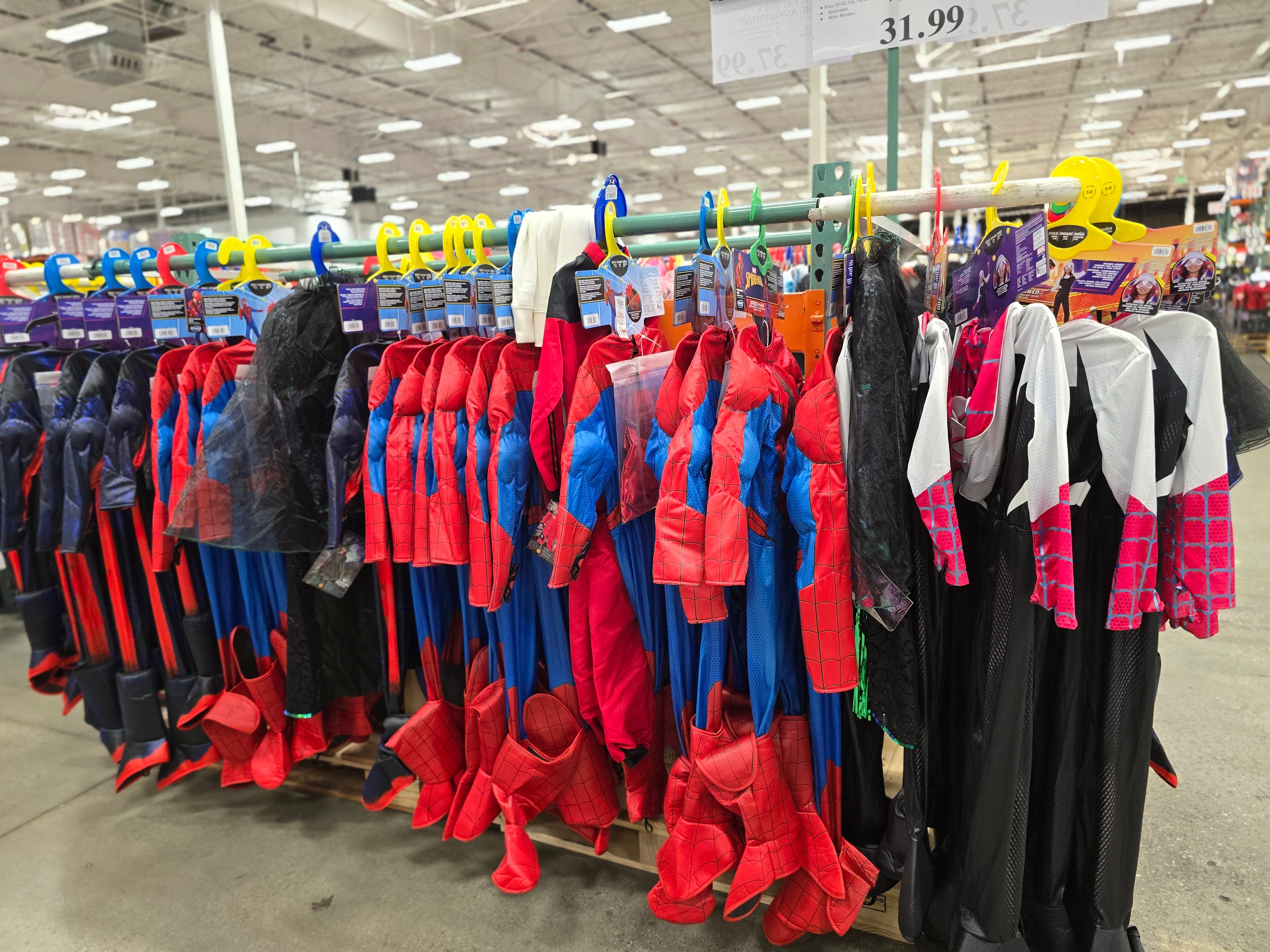 A rack of children's Spider-Man costumes at Costco.