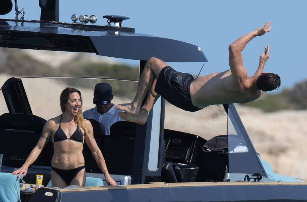 Mel C on the yacht and Chris Dingwall doing a back flip