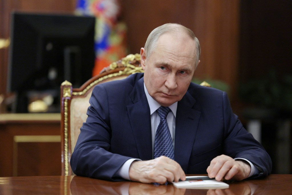 Vladimir Putin at a meeting in Moscow.