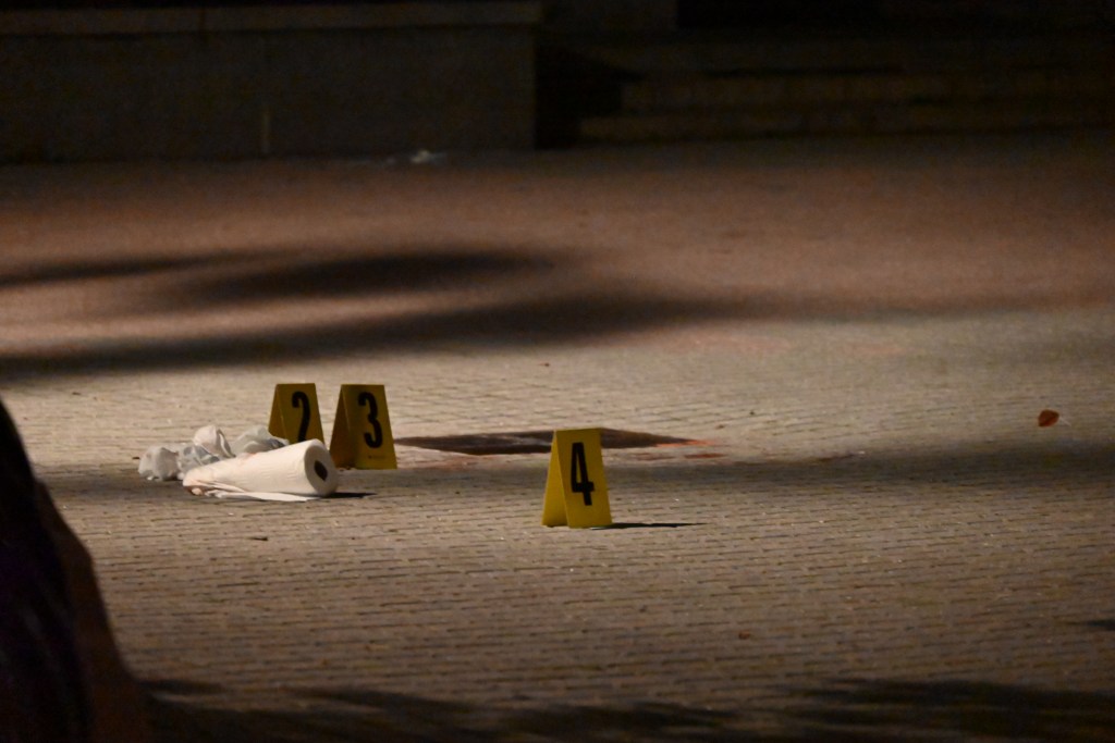 Crime scene markers at night.