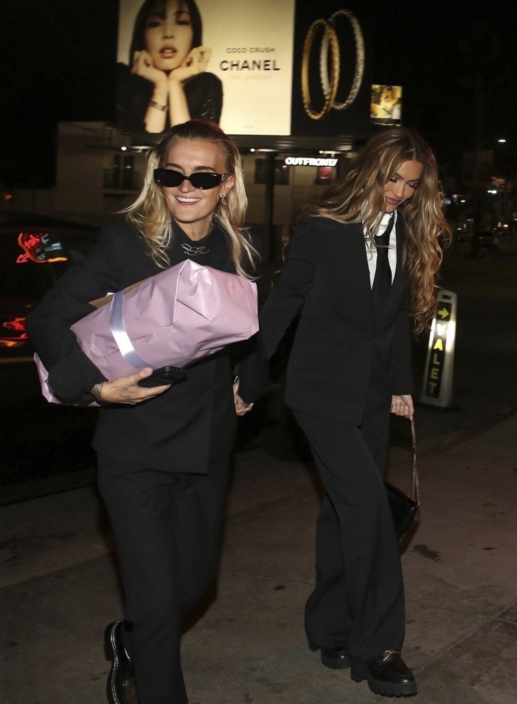Chrishell Stause and G Flip are seen arriving together at Cara Delevingne' birthday celebration 
