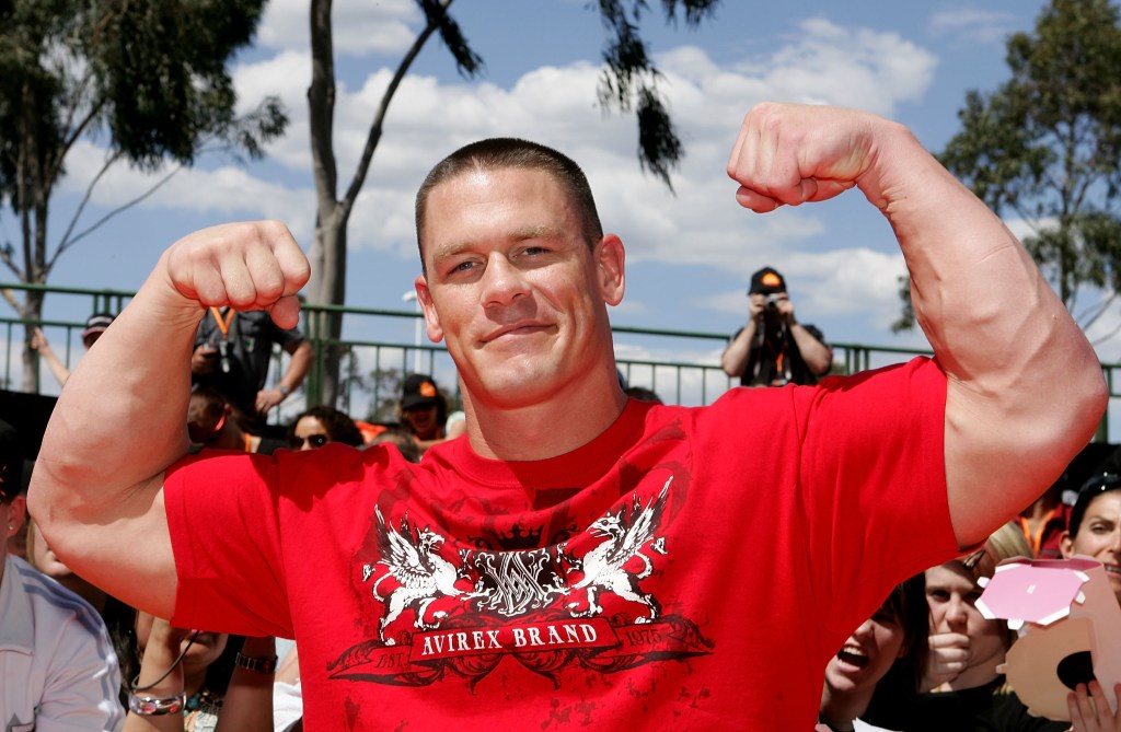John Cena flexing his muscles.