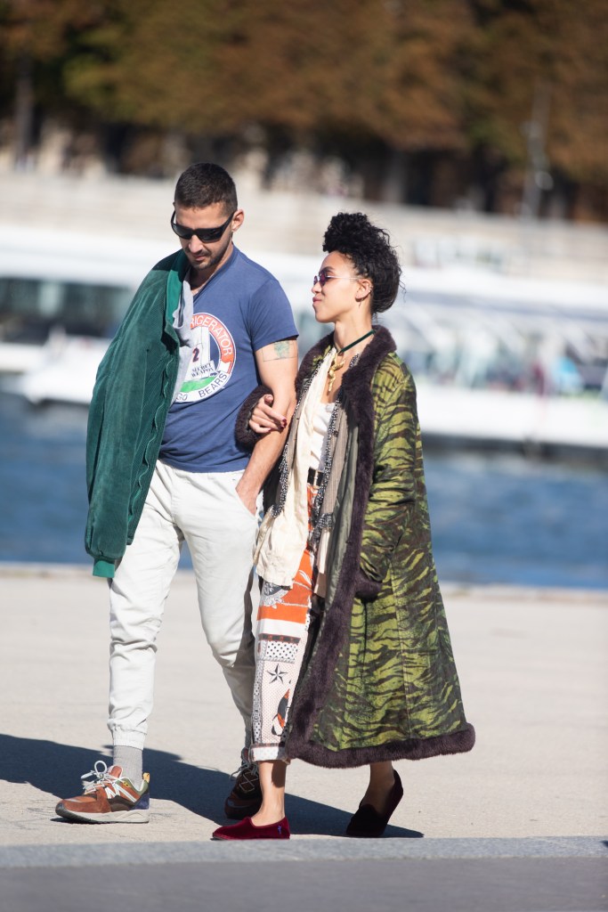 Shia LaBeouf walking with FKA Twigs in Paris, France.
