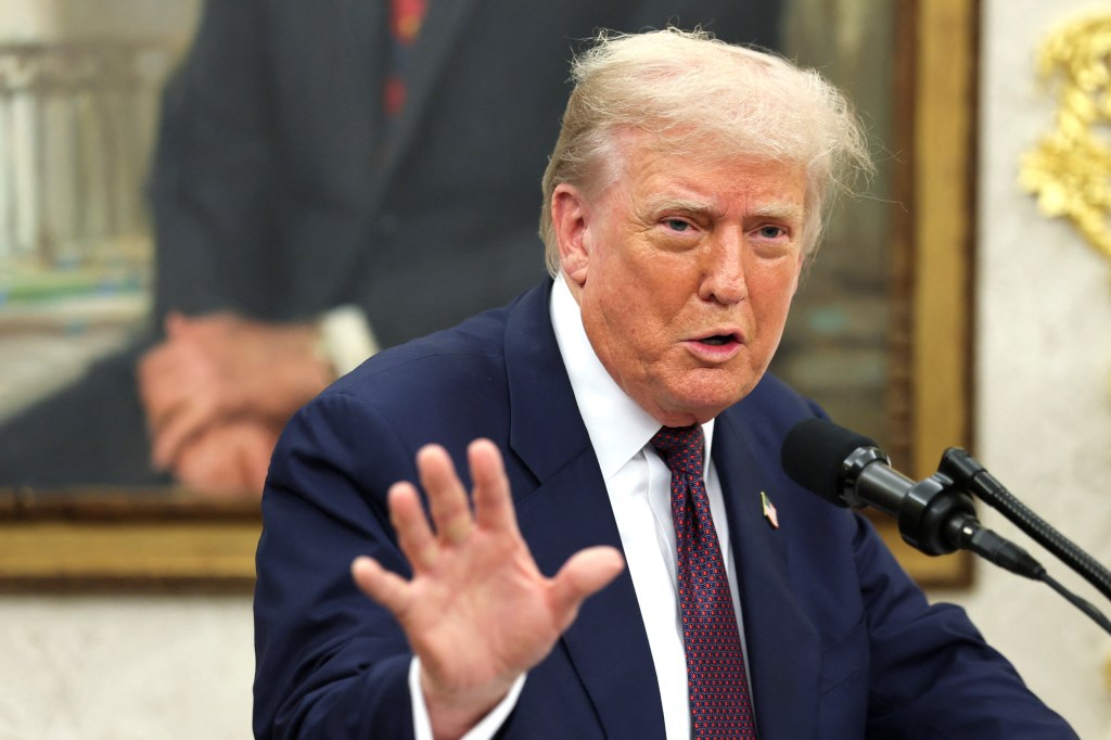 President Donald Trump speaks to reporters in the Oval Office of the White House on Aug. 6, 2025.