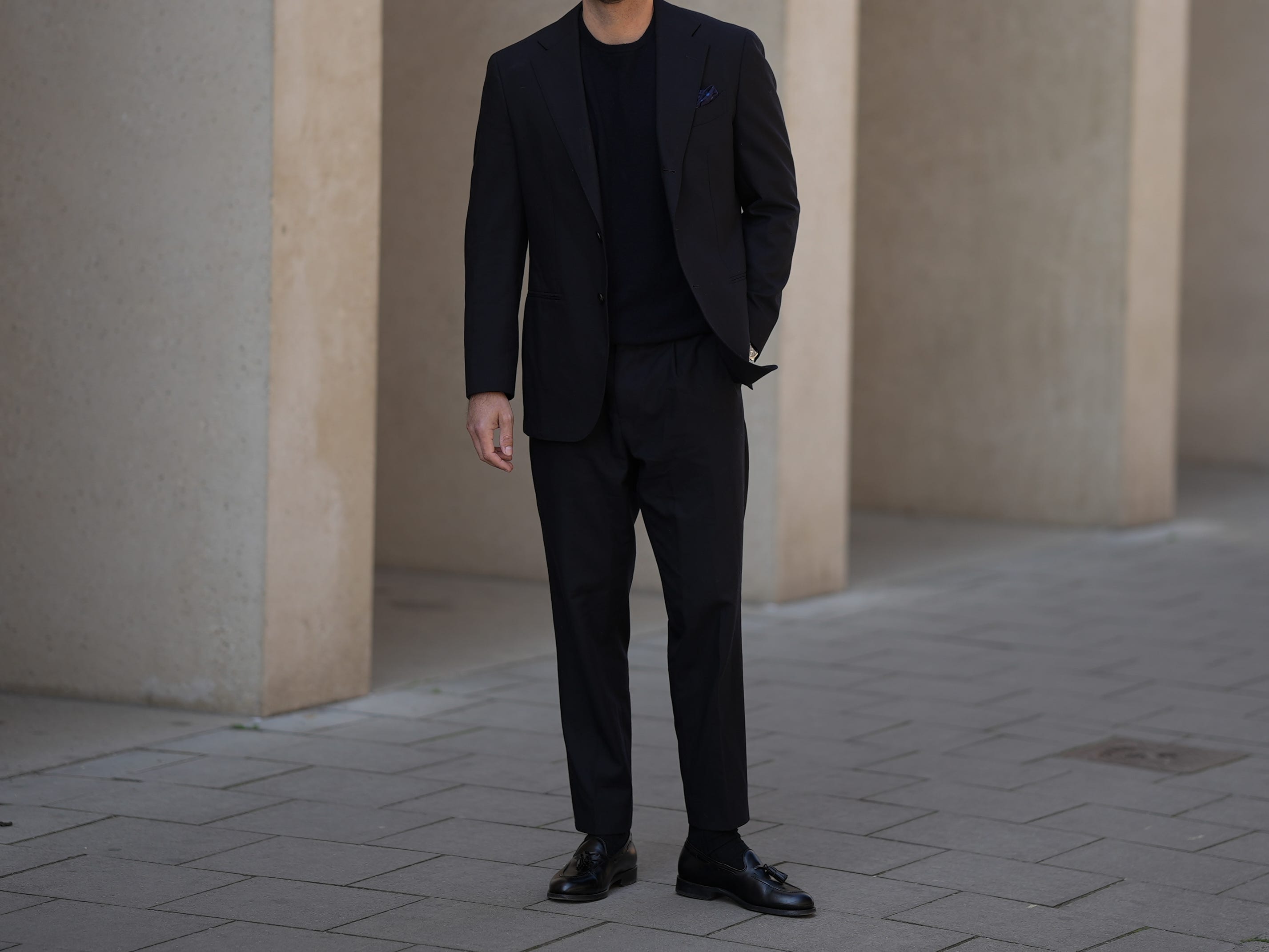 man wearing tailored suit