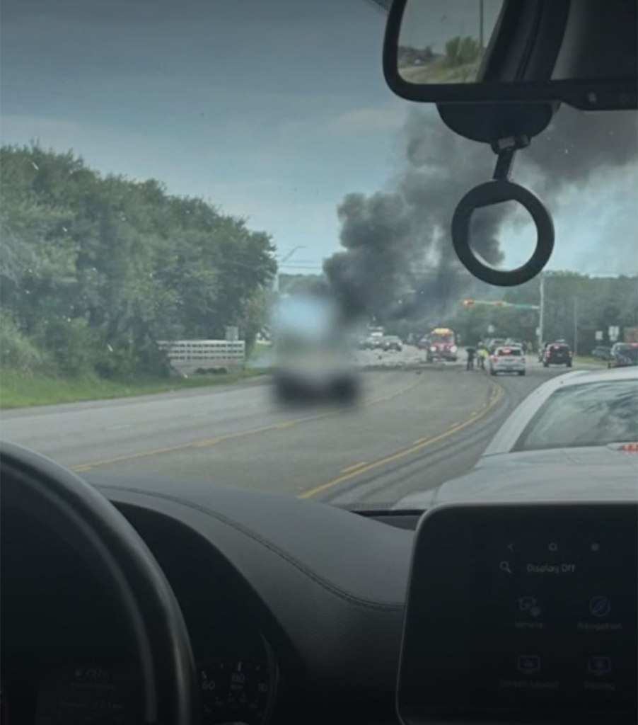 The SUV flipped and caught fire after it was hit by the oncoming truck.