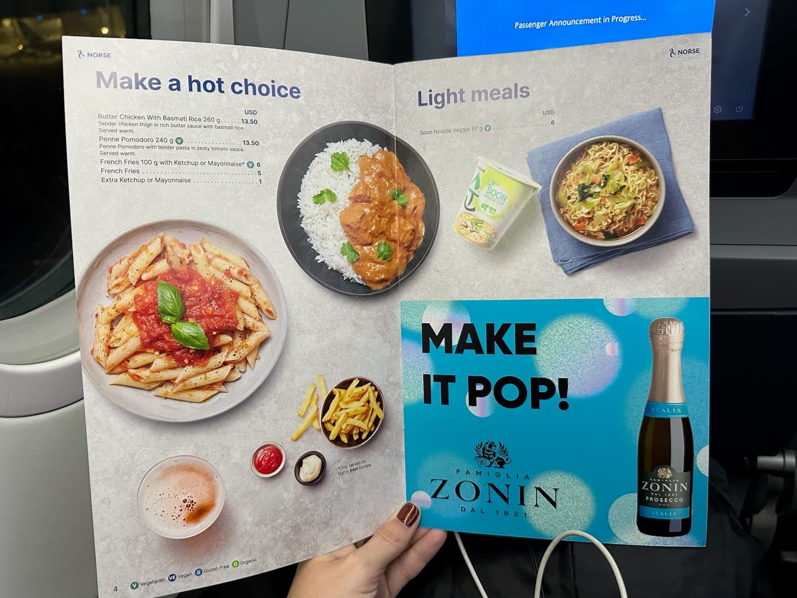 Norse airlines menu with dishes, champagne add