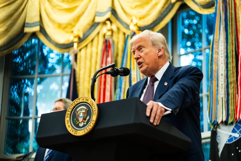Donald Trump speaks during a meeting with CEO of Apple Tim Cook in the Oval Office of the White House on Wednesday August 6, 2025.