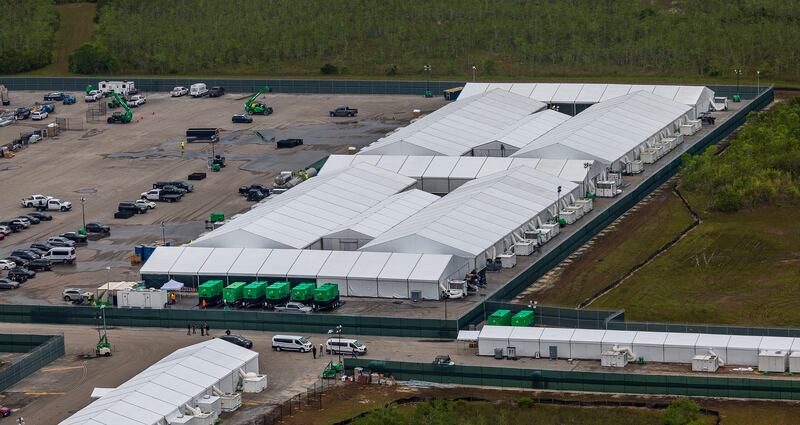 Aerial view of Alligator Alcatraz’s white tents. The Florida Everglades surrounds the facility on all sides.