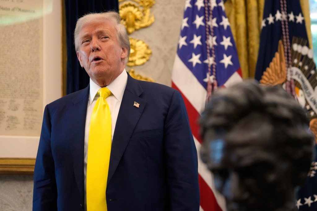Donald Trump speaking in the Oval Office.