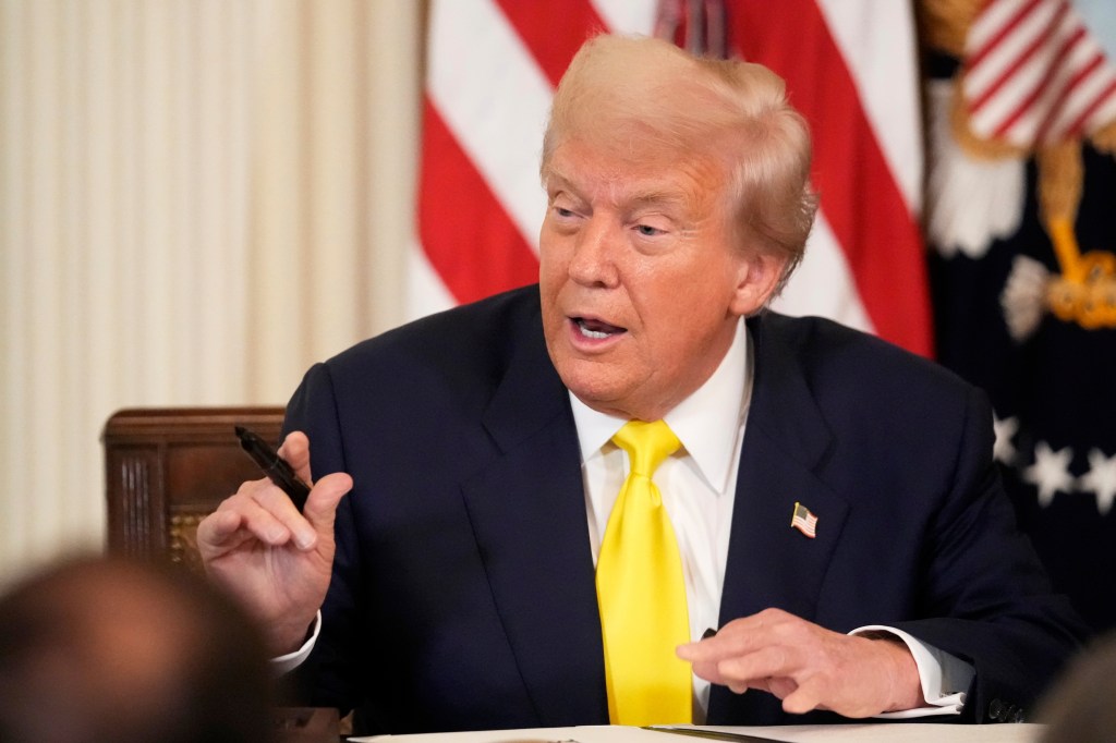 Donald Trump speaking at a signing ceremony.