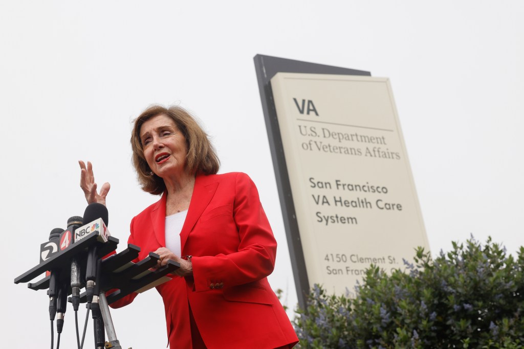 Rep. Nancy Pelosi speaking at a press conference outside the San Francisco VA Health Care System.