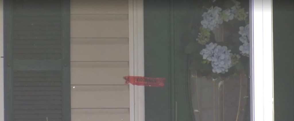 Crime scene tape on a door.