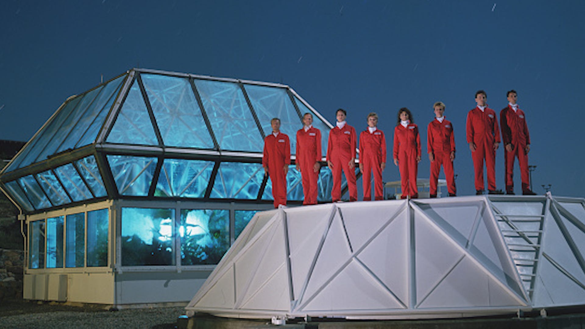 photo of Biosphere 2 crew in red jumpsuits