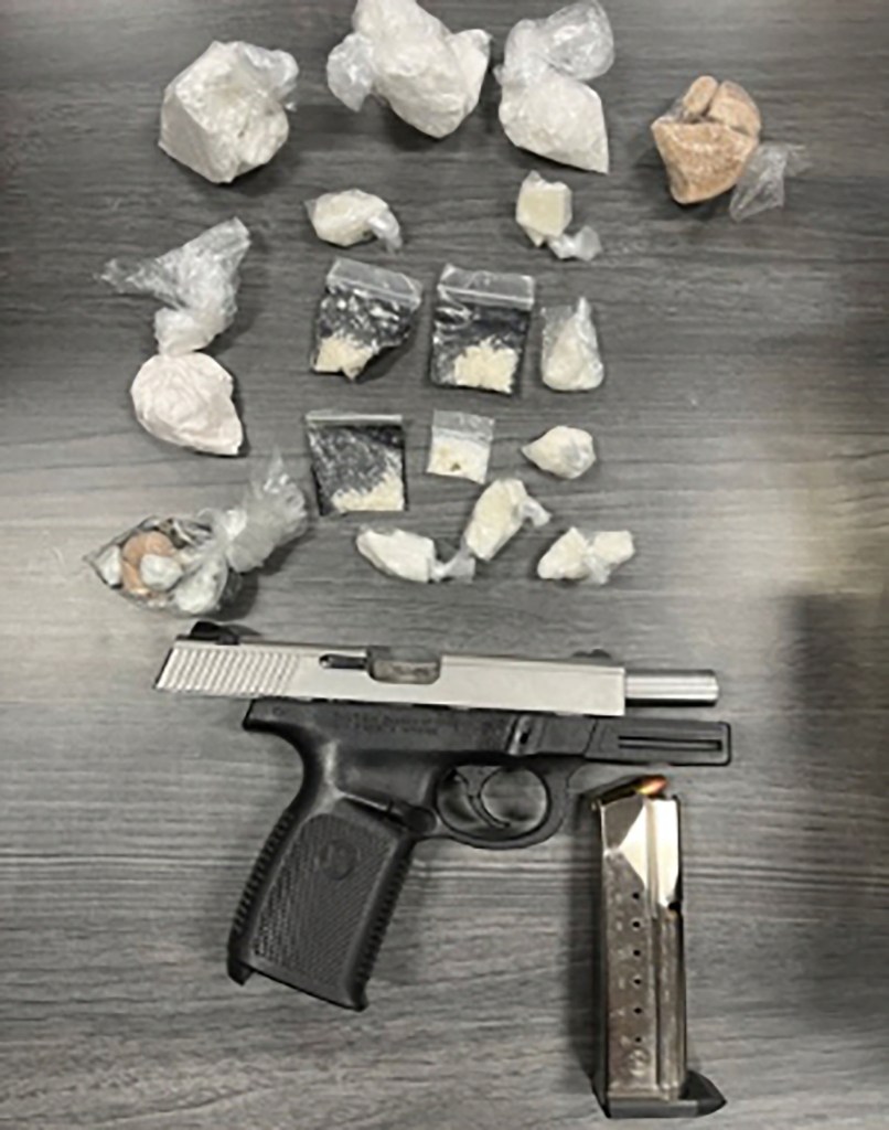 Seized handgun and drugs.