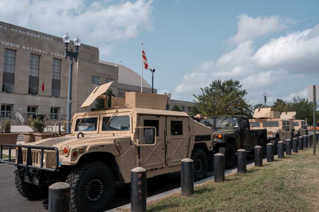 National Guard vehicles on standby outside the DC Armory.