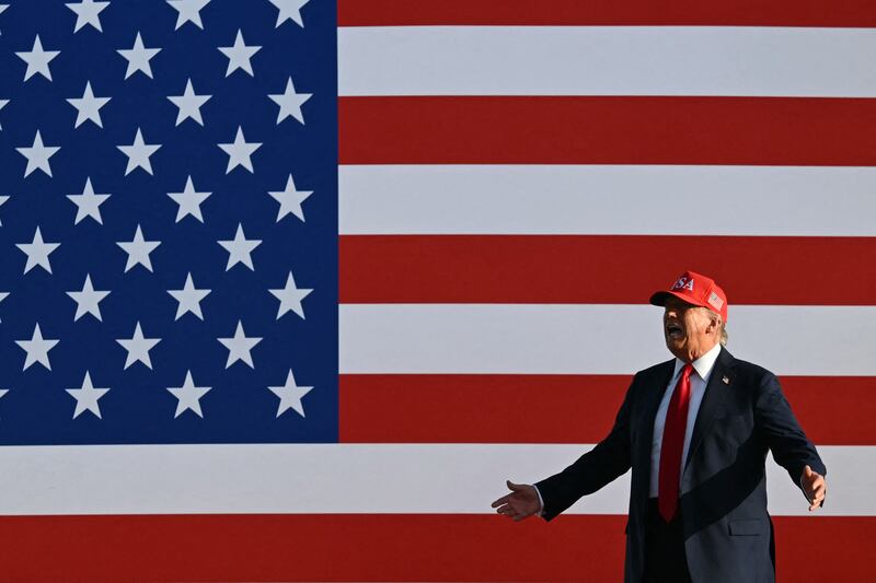 President Donald Trump gestures as he steps on stage at the Iowa State Fairgrounds in Des Moines on July 3, 2025.