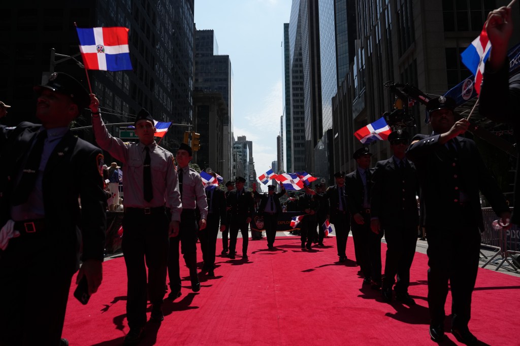 Participants gather during the National Dominican Day Parade on Sunday, August 11, 2024 in New York, N.Y. 