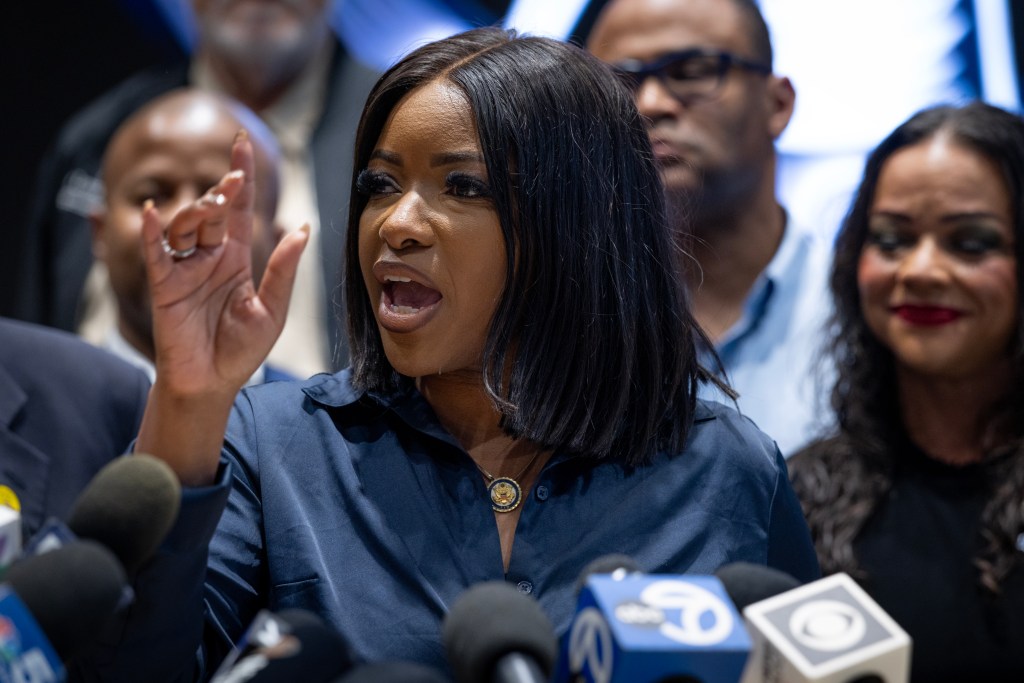 Rep. Jasmine Crockett speaking at a press conference.