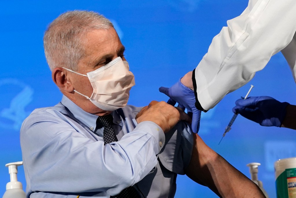 Dr. Anthony Fauci receives his first dose of the COVID-19 vaccine at the National Institutes of Health in Bethesda, Maryland on Dec. 22, 2020.