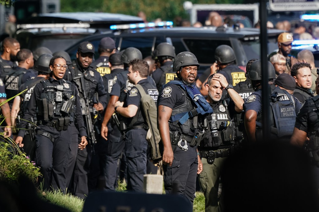 Georgia law enforcement gather outside the Centers for Disease Control Global Headquarters in Atlanta, Georgia on Aug. 8, 2025.