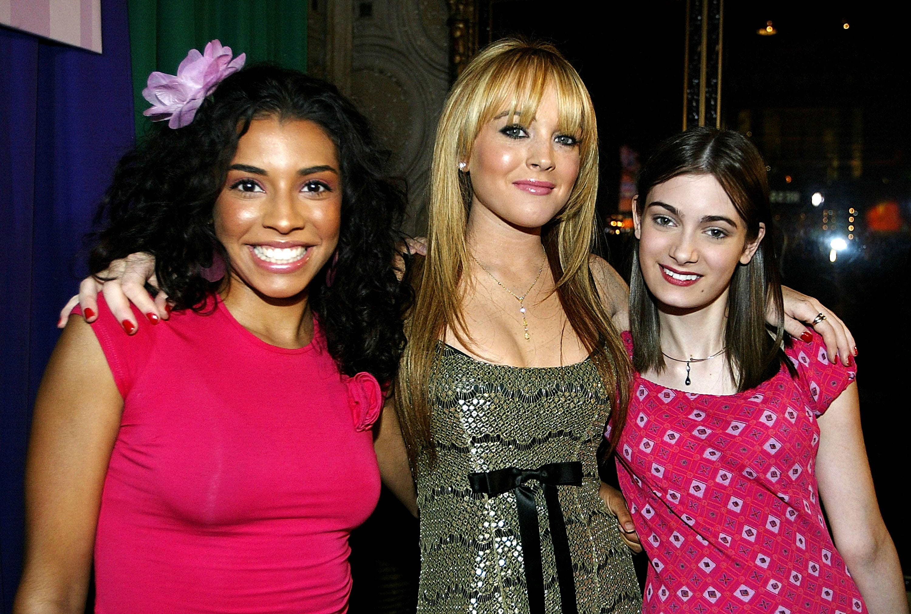 Lindsay Lohan arms around Christina Vidal and Haley Hudson
