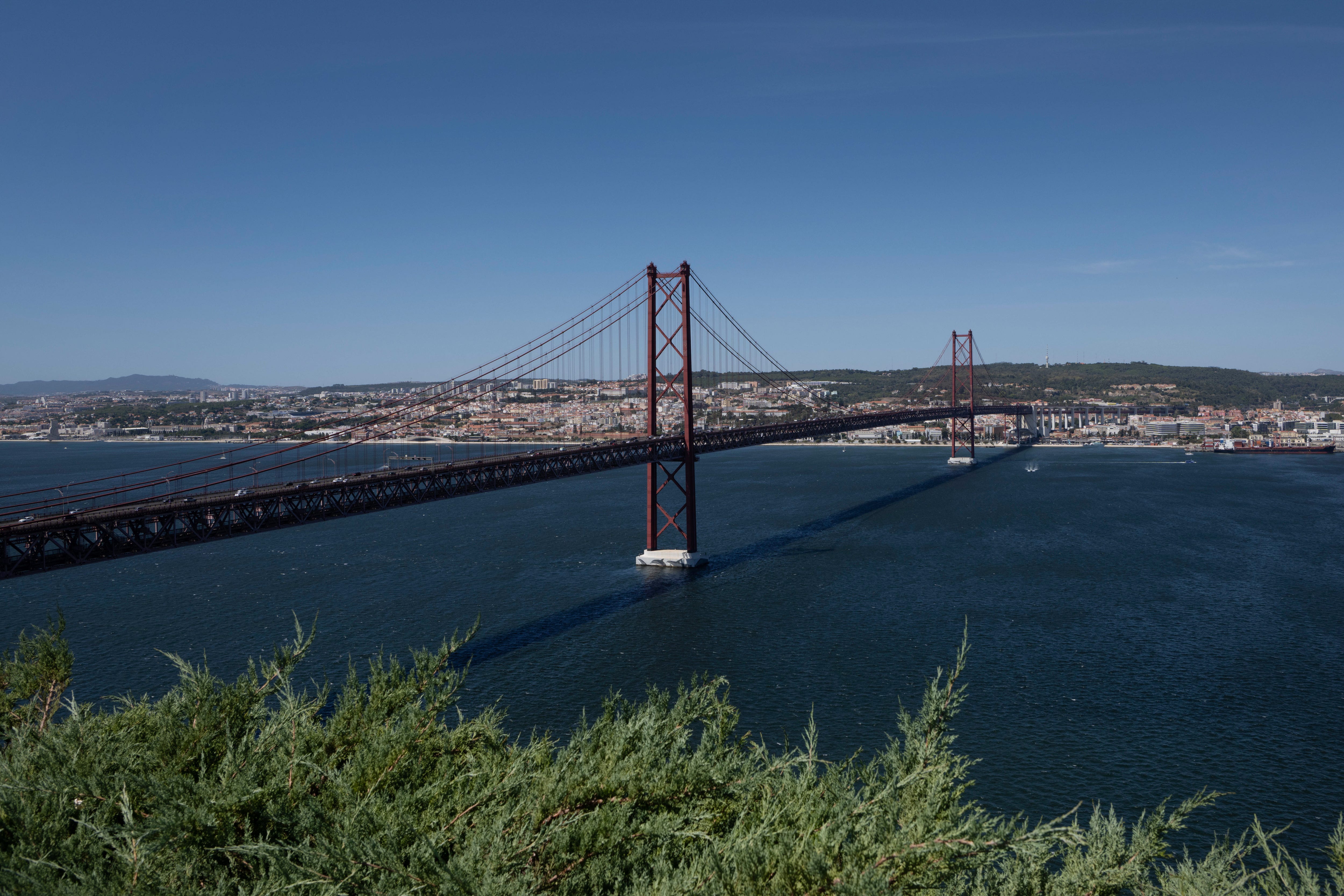 General view of the 25 de Abril Bridge with Lisbon in the background.