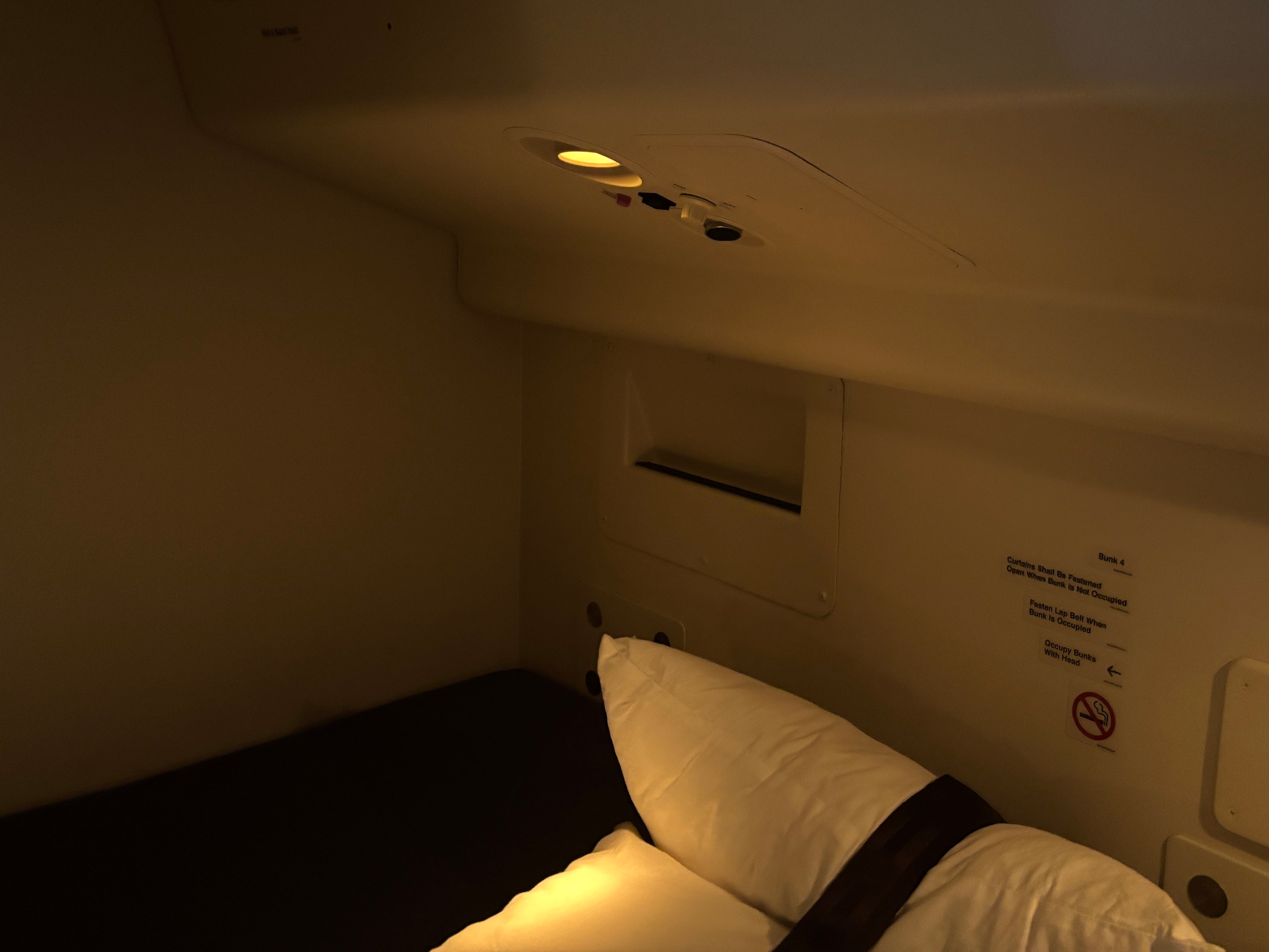 Lights and a storage pocket on on a Boeing 777-300ER